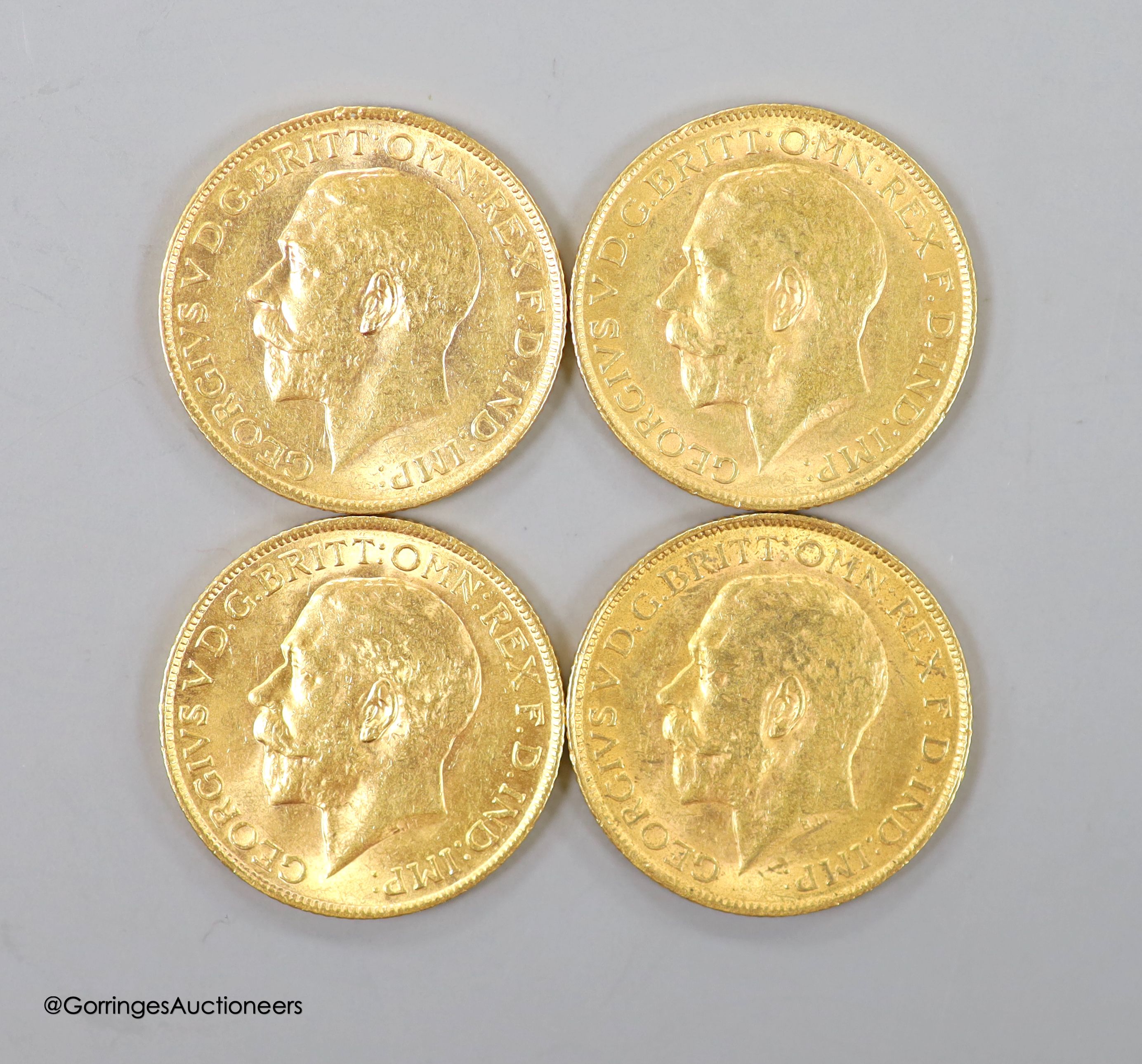 Four George V gold sovereigns, 1911, 1912, 1913 and 1915